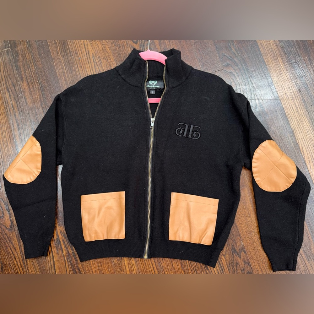 Ella denim black zip-up cardigan w/ tan leather elbow patches & chest pocket.